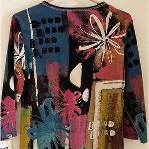 New Ladies small top, multicoloured never worn with labaels..